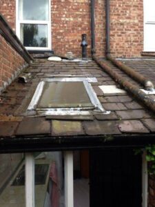 new kitchen extension with vellux window spanish slate and lead work 02