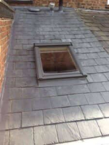 new kitchen extension with vellux window spanish slate and lead work 05