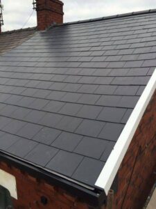 removal of old slate roof supplied and fitted a composite slate. new dry ridge 07