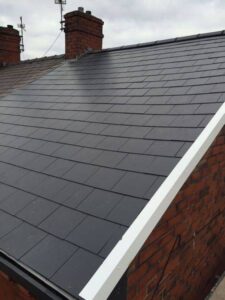 removal of old slate roof supplied and fitted a composite slate. new dry ridge 11