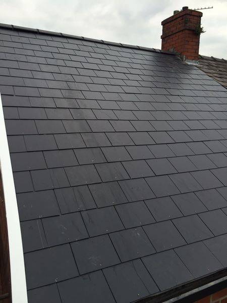 removal of old slate roof supplied and fitted a composite slate. new dry ridge 13