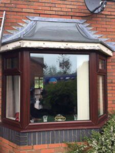rosewood fascia with white and rosewood soffit new gutters and dry verge 06 06