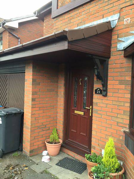 rosewood fascia with white and rosewood soffit new gutters and dry verge 09 09