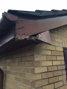 rosewood fascia with white and rosewood soffit new gutters and dry verge 14 14