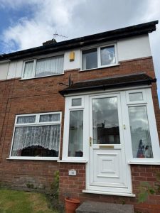 black-fascia-guttering-white-soffits-stockport-01
